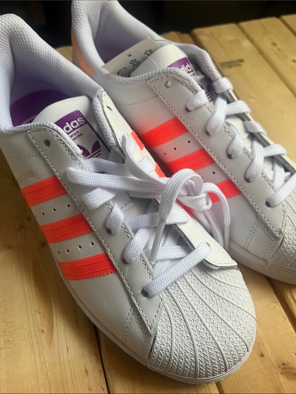 adidas Women’s White Sneakers with Neon Pink Stripes